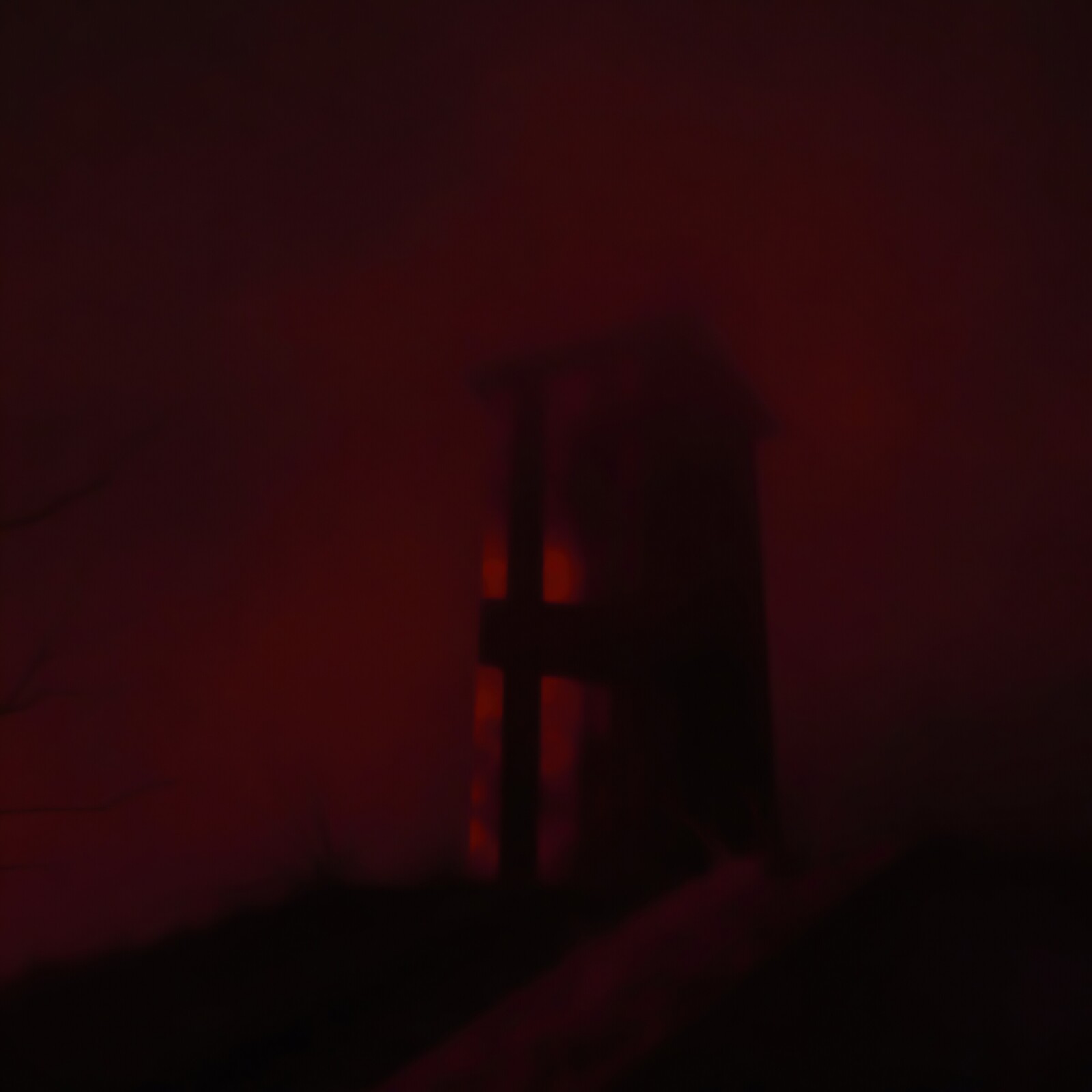 Mysterious tower shrouded in mist glows ominously at twilight