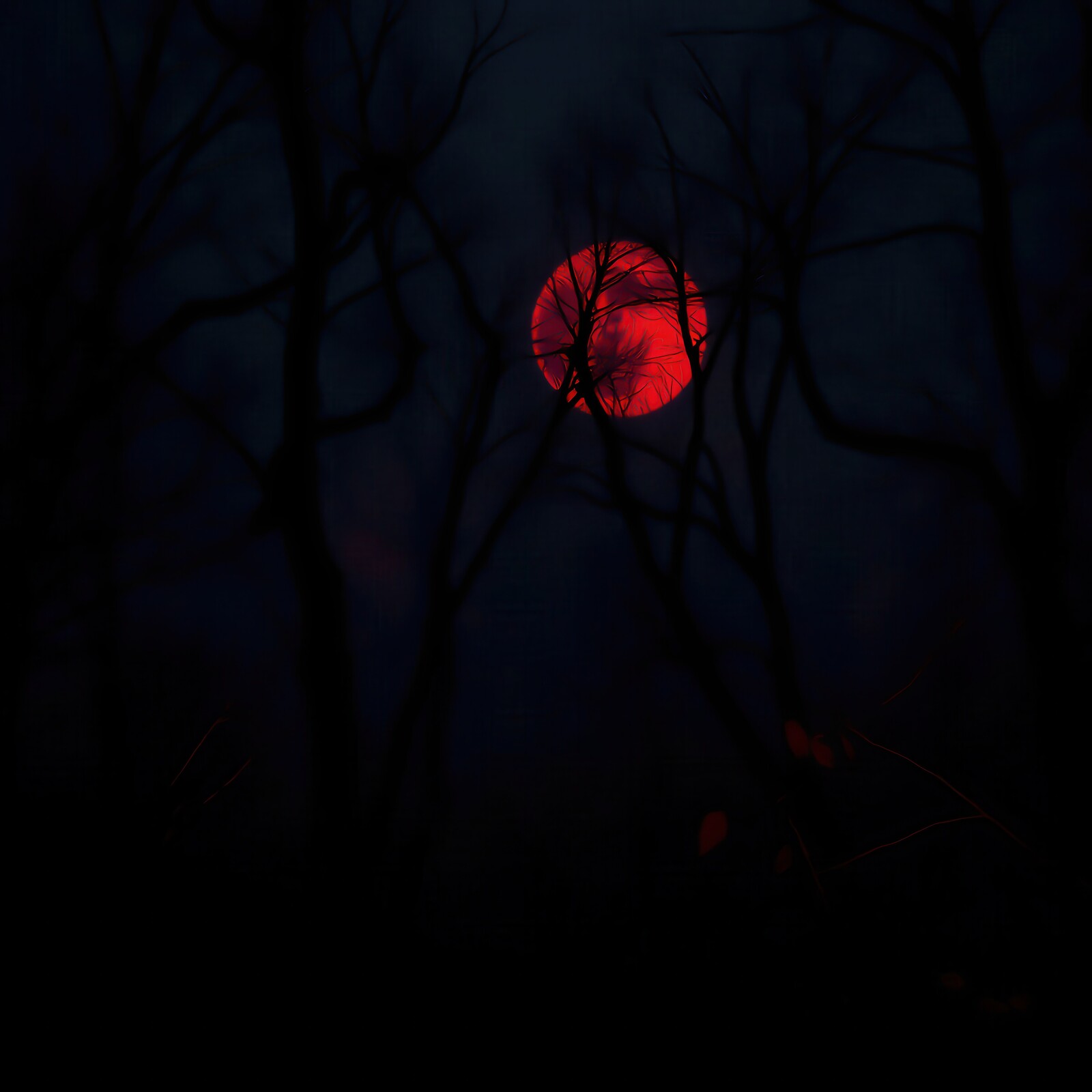 Silhouettes of bare trees framing a vivid crimson moonlight on a cold winter night