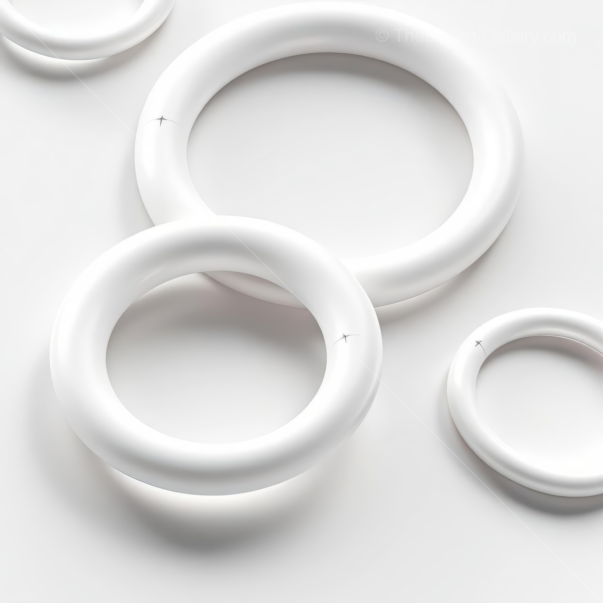 Unique white circular objects arranged artistically on a smooth surface in a minimalist style reflecting simplicity and elegance