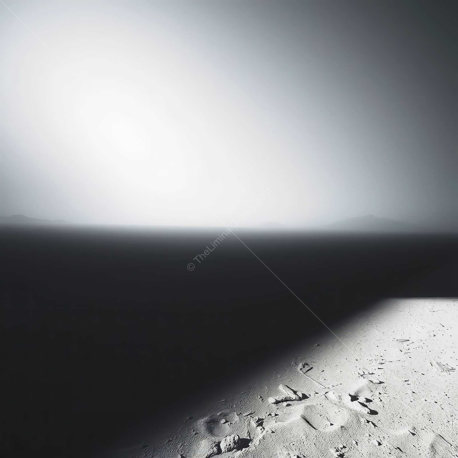 Vast expanse of a desolate landscape under a soft, glowing light at dawn