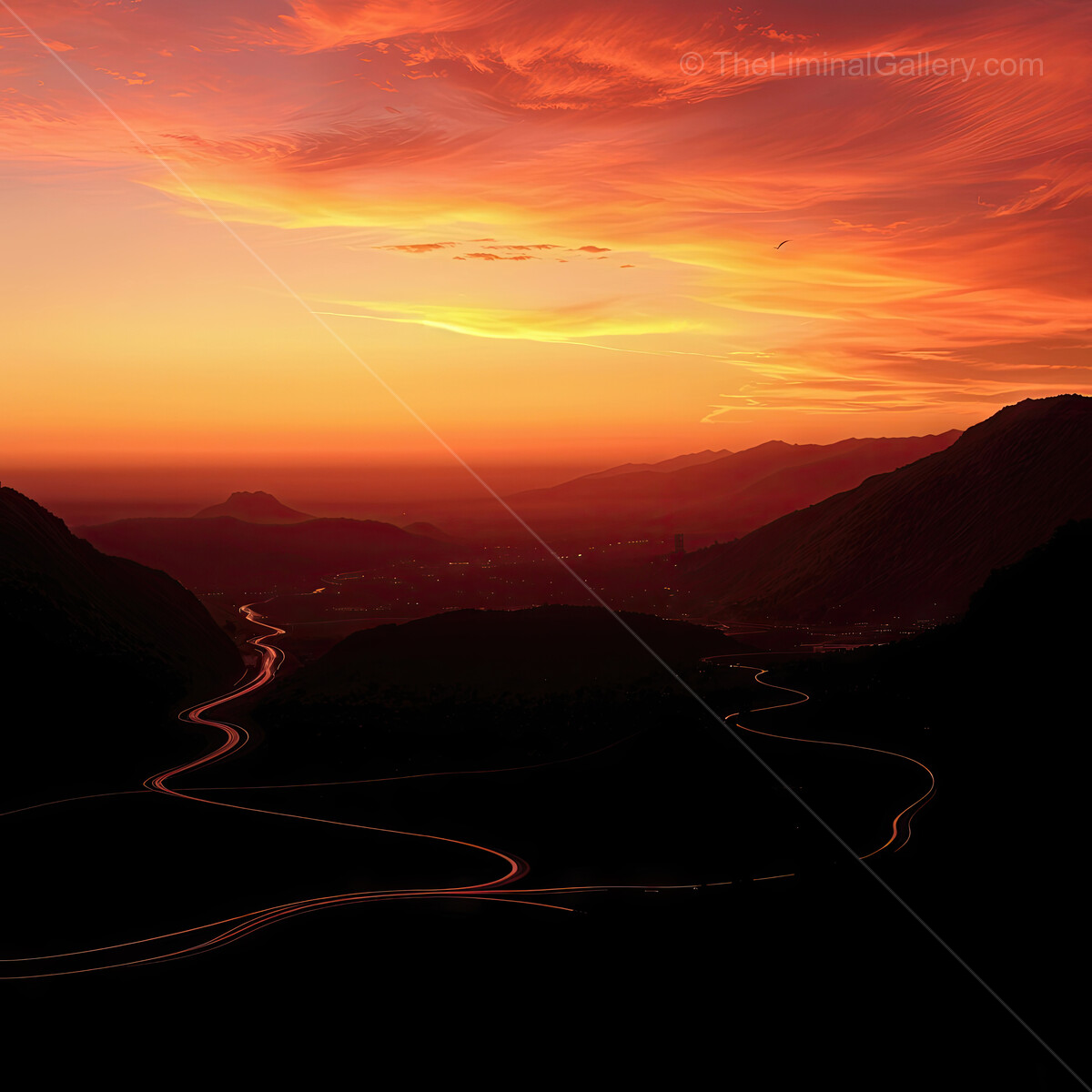Sky ablaze with vibrant colors at sunset over winding mountain roads