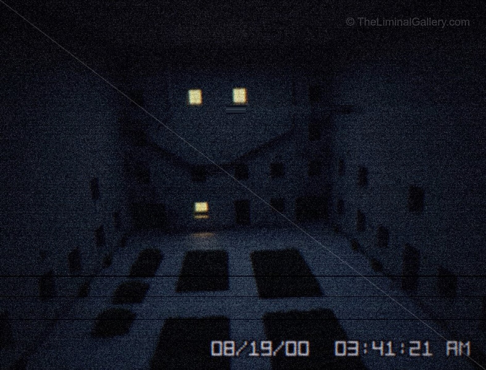 The unsettling courtyard and the countless windows offer no escape.